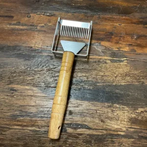 Serbian-Style Uncapping Scratcher